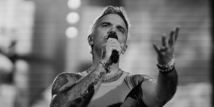 ROBBIE WILLIAMS ENFRENTA DEMANDA POR AUTORÍA DE LA CANCIÓN ANGELS; MÚSICO IRLANDÉS RECLAMA COAUTORÍA Y GANANCIAS DEL ÉXITO 1 ROBBIE WILLIAMS ENFRENTA DEMANDA POR AUTORÍA DE LA CANCIÓN ANGELS; MÚSICO IRLANDÉS RECLAMA COAUTORÍA Y GANANCIAS DEL ÉXITO